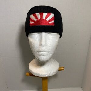 Vintage Knit Headband with Red and White Sunburst Design